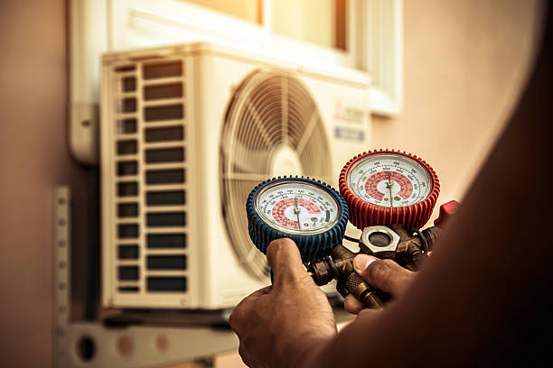Professional Air Conditioning Service technician working in Hockessin, DE